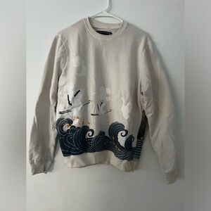 Graphic long sleeve sweater
